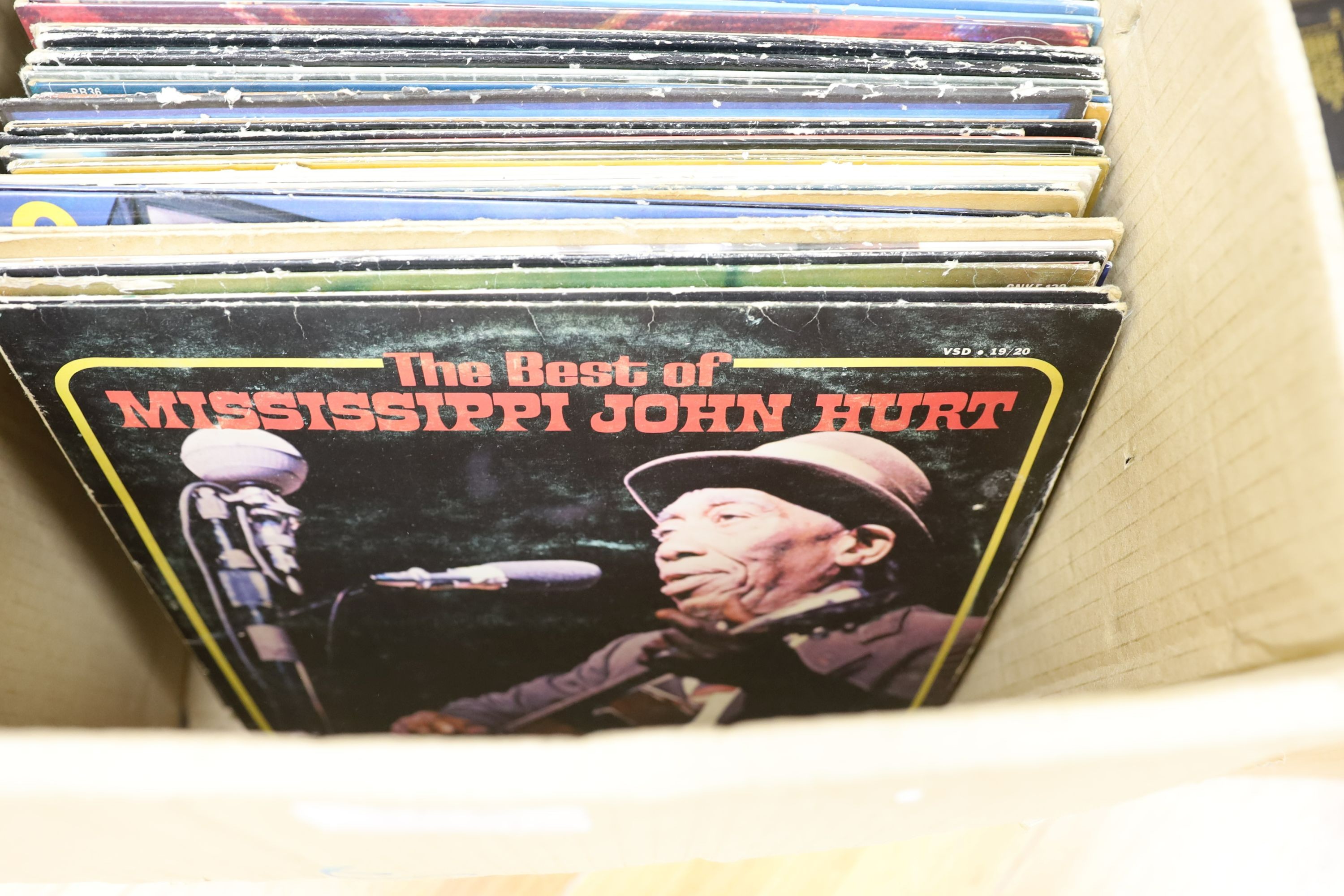 A collection of approximately 87 vinyl LPs to include The Beatles, David Bowie, Traffic, 10CC, Carly Simon etc